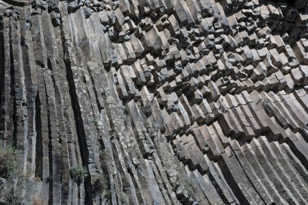 Basalt columns are natural pillars made of hardened lava caused by the contraction of volcanic rock as it cools. Armenia, Caucasus.