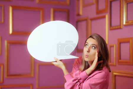 Photo for Woman Holding a Speech Bubble Having a Secret to Tell - Royalty Free Image