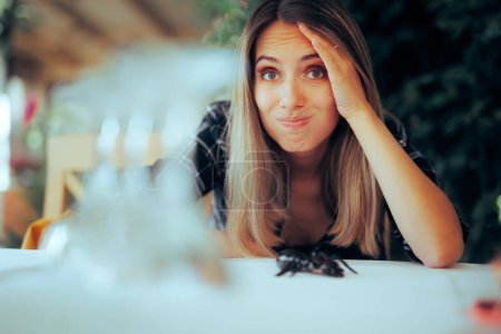 Photo for Unhappy Restaurant Customer Finding a Big insect on the Table - Royalty Free Image