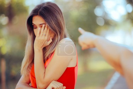 Photo for Hand Pointing to an Ashamed Young Girl Feeling Guilty - Royalty Free Image