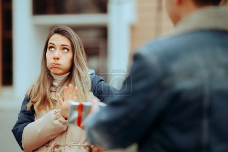 Woman Saying No to Attention and Gifts from a Man Perusing Her 