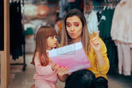 Photo for Mother Saying No to her Daughter to a New Toy She Wants - Royalty Free Image