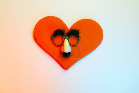 Photo for Funny Heart Wearing Mustache Big Nose Party Eyeglasses - Royalty Free Image