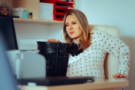Pregnant Woman Feeling Nauseated at the Office Desk 