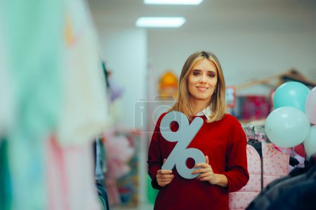 Saleswoman in the Store Holding a Discount Sign Promoting best Deals