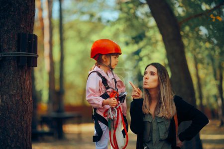 Photo for Mother Scolding Little Girl to Stay Safe in Rope Park - Royalty Free Image