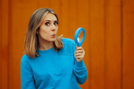 Woman Holding a Magnifying Glass Looking Surprised 
