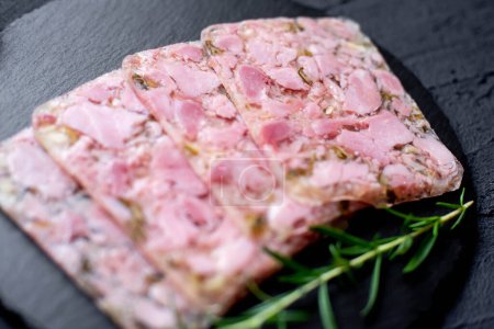 Photo for Head cheese or brawn, jelly meat with spices and herbs, close up view - Royalty Free Image