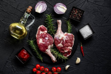 Photo for Raw lamb legs with spices, close up view, food concept - Royalty Free Image