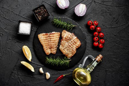 Photo for Grilled fish steak with spices. close up view, food concept - Royalty Free Image