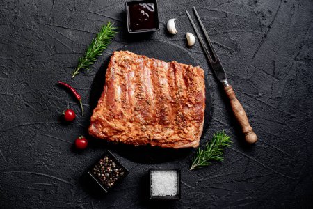 Photo for Grilled pork ribs with rosemary and spices, food concept - Royalty Free Image