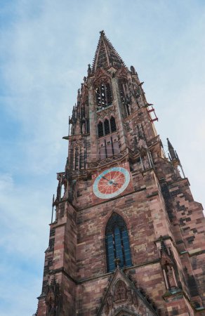 The church tower of Freiburg Minster in Germany on a sunny day