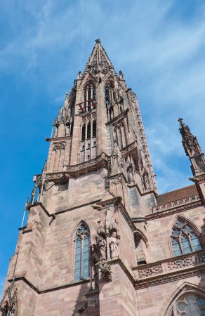 The church tower of Freiburg Minster in Germany on a sunny day