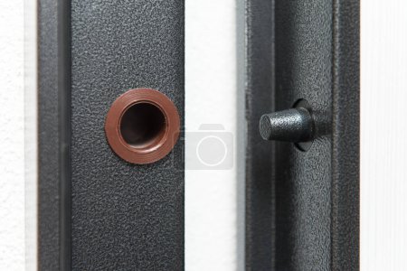 Photo for Modern Metal Door Element - Close Up Sturdy Steel Door - Royalty Free Image