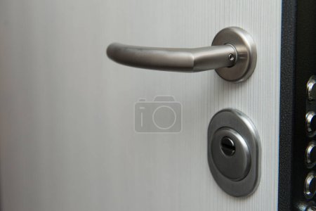 Photo for Modern Metal Door Handle - Very Sturdy Steel Door - Royalty Free Image