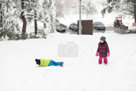 Photo for Borhter and Sister Having Fun Together in Beautiful Winter Park - Royalty Free Image