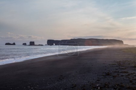 Photo for Basalt rock formations Troll toes on black beach. Reynisdrangar, Vik, Iceland - Royalty Free Image