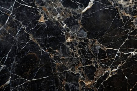 Texture of black marble with golden veins