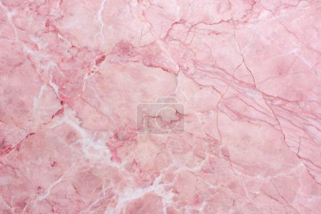 Texture of pink marble with golden veins