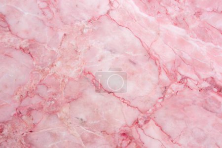 Textura de mármol rosa con venas doradas