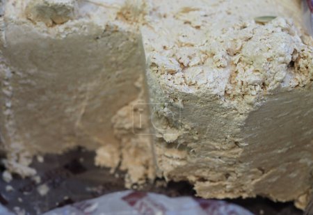 Traditional Eastern Halva on the Counter: A Detailed Shot of Sweets in a Store