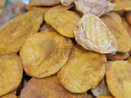 Dried Mango on a Store Shelf: Exotic Eastern Sweets with Vibrant Color and Unmatched Flavor