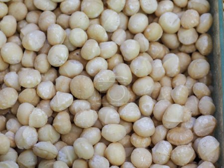 Gleaming Cleaned Macadamia Nuts as a Symbol of Healthy Eating and Natural Luxury