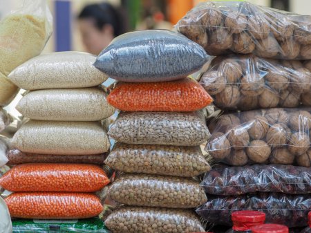 Colorful Bags of Various Grains at a Market Stall: A Pattern of Nutrition