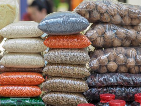 Colorful Bags of Various Grains at a Market Stall: A Pattern of Nutrition
