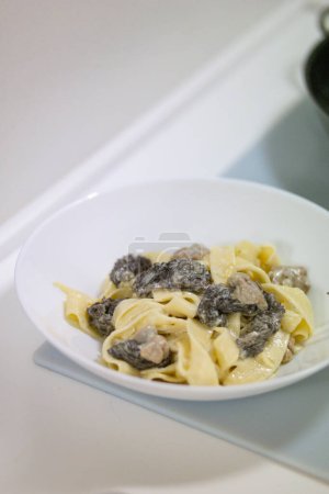 Photo for Morel mushroom cream sauce with pasta. High quality photo - Royalty Free Image