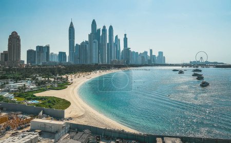 View from the promenade and tram monorail in The Palm Jumeirah island in Dubai, UAE. High quality photo