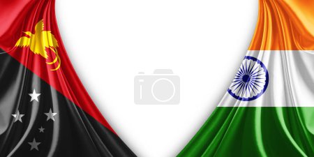 Foto de Bandera de Nueva Guinea y Bandera de la India de seda y fondo blanco-3d ilustración. - Imagen libre de derechos