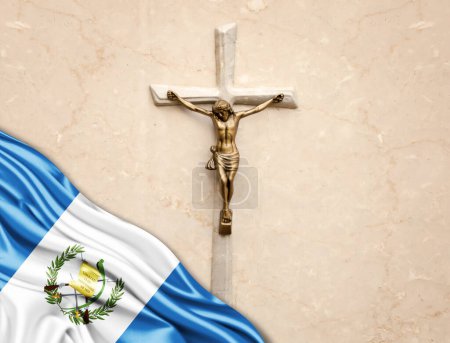 Téléchargez les photos : Guatemala drapeau de soie avec Jésus-Christ, statue, croix, appuyé sur fond de marbre - en image libre de droit