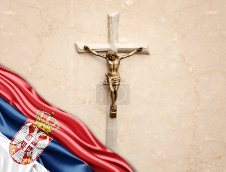 Téléchargez les photos : Serbie drapeau de soie avec Jésus-Christ, statue, croix, appuyé sur le fond de marbre - en image libre de droit