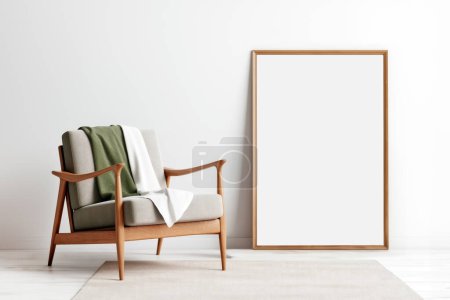 Mockup of a frame on a floor in a Scandinavian minimalist interior with a chair and white walls