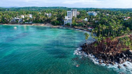 Photo for Beautiful Indian Ocean coastline on the island of Sri Lanka, Mirissa. Aerial photography. - Royalty Free Image