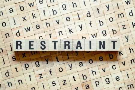 Photo for Restraint - word concept on cubes, text, letters - Royalty Free Image