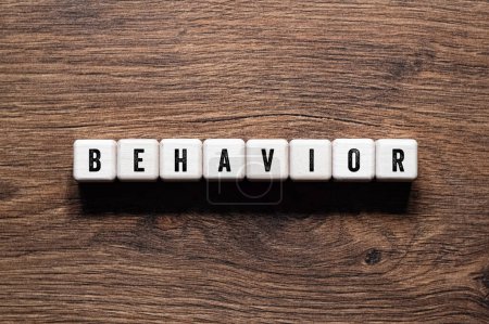 Behavior - word concept on building blocks, text, letters