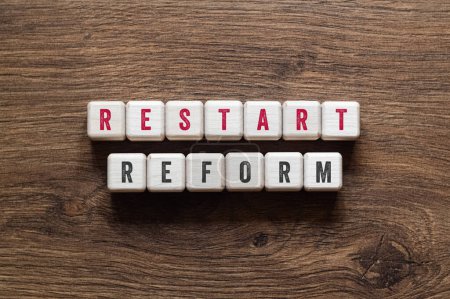 Restart reform - word concept on building blocks, text, letters