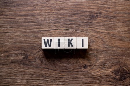 Wiki - word concept on building blocks, text, letters