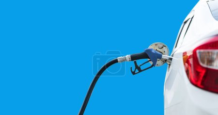 Photo for Man hand filling and pumping gasoline oil the car with fuel at station, Filling car with gas fuel at station pump - Royalty Free Image