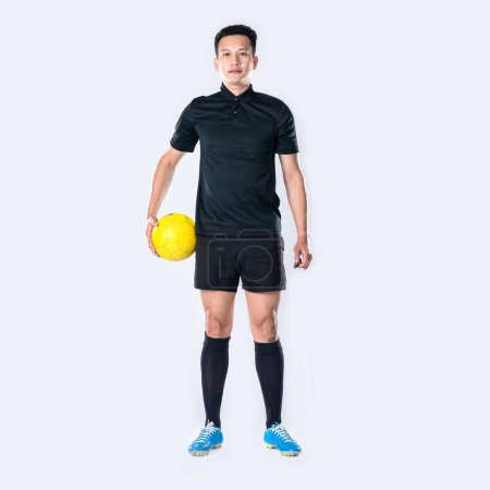 Photo for Soccer referee holding whistle and holding ball isolated on white background. - Royalty Free Image