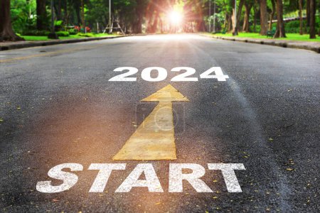 Start to 2024  written on the road on nature background with sunlight. Business planning concept and new year beginning success idea