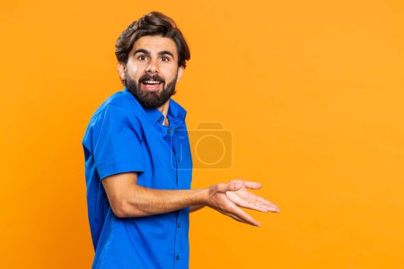 Photo for Man raising hands asking what why reason of failure, demonstrating disbelief irritation by troubles trendy social media meme anti lifehacks ridicules people who complicate simple tasks for no reason - Royalty Free Image