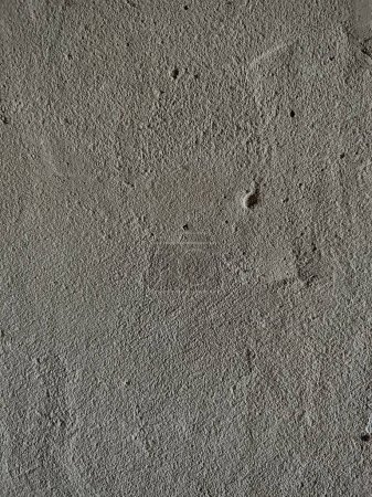 Photo for The texture of the plaster on the wall in small details. Cement wall with defects and chips. The wall is under construction in good quality. Texture of concrete and cement - Royalty Free Image