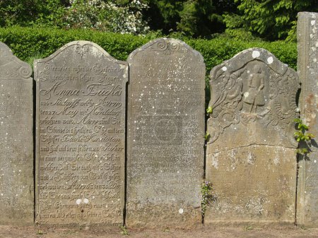 historic tombstones on cemetery on island Amrum, northsea germany
