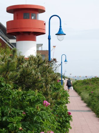 lighthouse at island Amrum, promenade, northsea of germany
