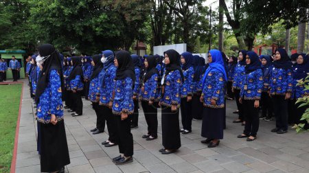 Photo for Indonesian Civil Servants are attending the ceremony wearing Korpri clothes, Pekalongan November 29 2023 - Royalty Free Image