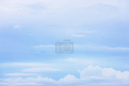 Photo for Blue sky background with little white clouds,blue sky with clouds,abstract style for text, design, fashion, agency, website, blogger, publication, online marketing, brand, style, layout, animation. - Royalty Free Image