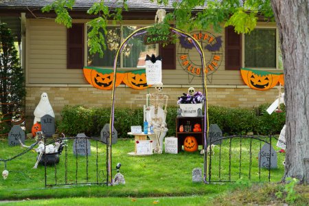 Photo for New Lisbon, Wisconsin USA - October 8th, 2022: Homeowners of the community dressed up their house and yard with scary Halloween decorations for 2022. - Royalty Free Image